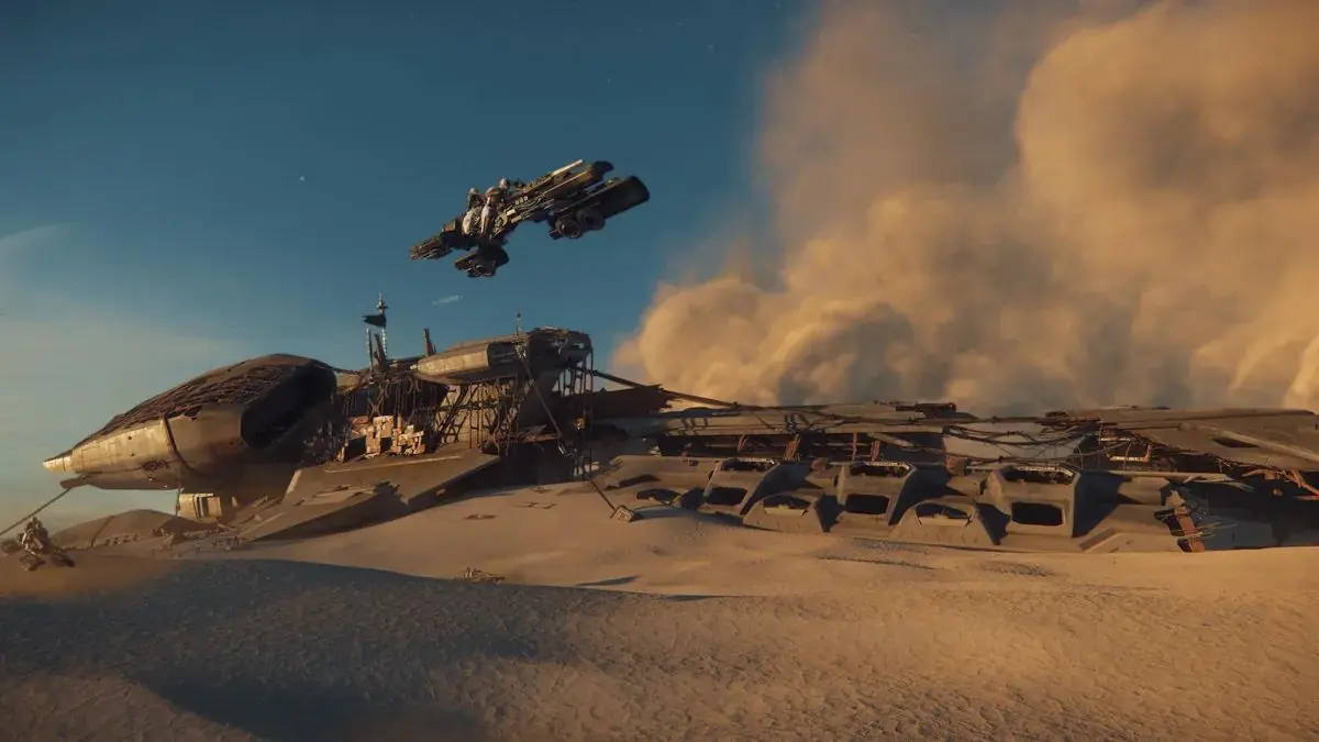 A derelict spacecraft resting on a sandy planetary surface